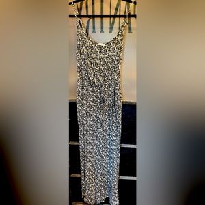 “Timing” Romper with tie around waist, black and white floral print